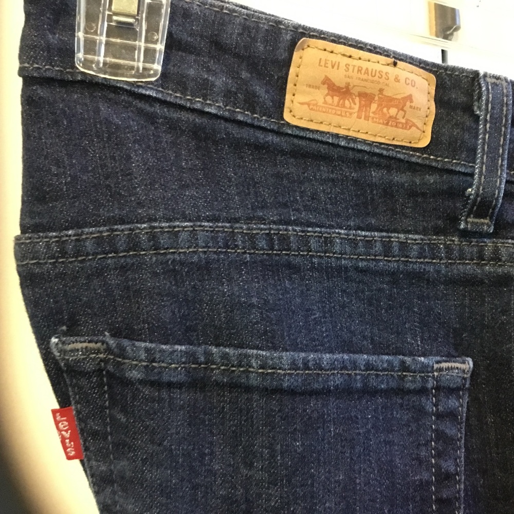Levi’s mid rise skinny jeans.